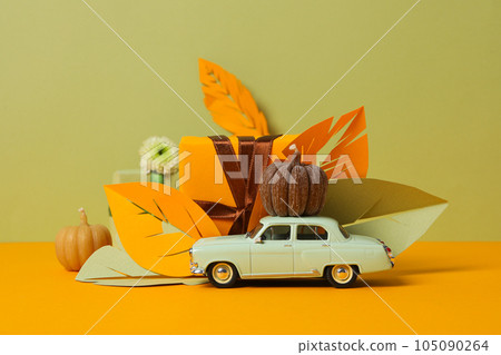 Autumn or fall travel and vacation concept with car Autumn or fall travel and vacation concept with car 105090264