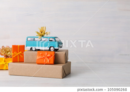 Autumn or fall travel and vacation concept with car 105090268