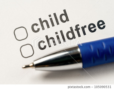 Child or Childfree checkbox on white paper with blue pen. Questionnaire for parents. Form of marital status, Questionnaire do you want to have children. Answer is in checklist test. 105090531