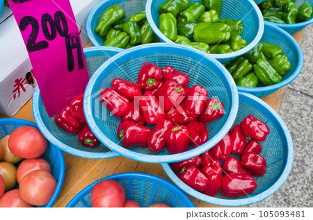 Red and green peppers 105093481