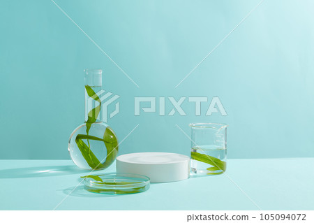 Some laboratory glassware containing seaweed surrounded a empty podium in white color. The healing benefits of seaweed for skin are so numerous 105094072