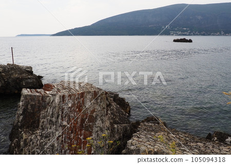 Fort Mezaluna Mesaluna Citadel Citadela Montenegro, Herceg Novi. The ruins of an ancient stone fortress, destroyed in an earthquake, fell into the Adriatic Sea, the Mediterranean. Tourist attractions Fort Mezaluna Mesaluna Citadel Citadela Montenegro, Herceg Novi. The ruins of an ancient stone fortress, destroyed in an earthquake, fell into the Adriatic Sea, the Mediterranean. Tourist attractions 105094318