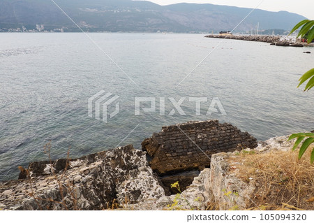 Fort Mezaluna Mesaluna Citadel Citadela Montenegro, Herceg Novi. The ruins of an ancient stone fortress, destroyed in an earthquake, fell into the Adriatic Sea, the Mediterranean. Tourist attractions Fort Mezaluna Mesaluna Citadel Citadela Montenegro, Herceg Novi. The ruins of an ancient stone fortress, destroyed in an earthquake, fell into the Adriatic Sea, the Mediterranean. Tourist attractions 105094320
