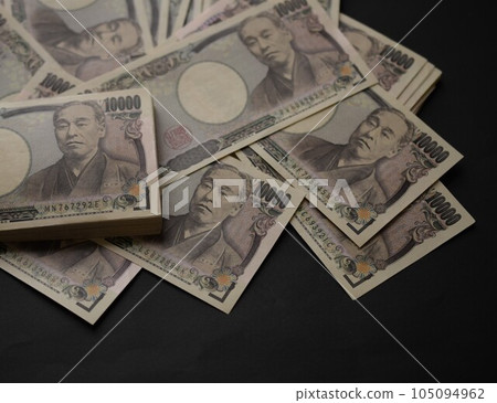 10,000 yen bill, 10,000 yen bill on black background 105094962
