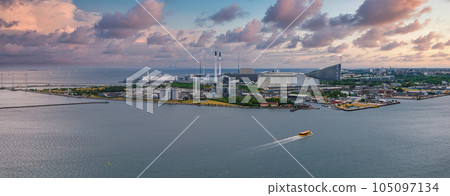 Aerial panorama of Indre Osterbro, Nordhavnen districts. New modern district in Copenhagen, Denmark. Beautiful modern buildings, Portland Towers and UN. Aerial panorama of Indre Osterbro, Nordhavnen districts. New modern district in Copenhagen, Denmark. Beautiful modern buildings, Portland Towers and UN. 105097134