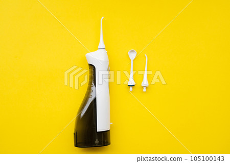 Mouth aerator on a yellow background with different nozzles. View from above 105100143