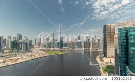 Aerial view to Dubai Business Bay and Downtown with the various skyscrapers and towers timelapse Aerial view to Dubai Business Bay and Downtown with the various skyscrapers and towers timelapse 105102196