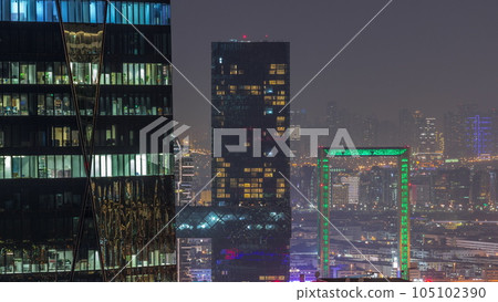 Bur Dubai and Deira districts aerial night timelapse viewed from financial district. 105102390