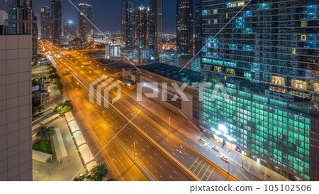 Business bay district skyline with modern architecture night to day timelapse from above. Business bay district skyline with modern architecture night to day timelapse from above. 105102506