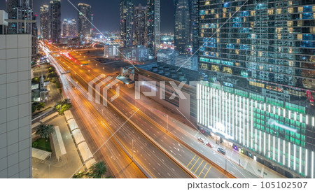 Business bay district skyline with modern architecture all night timelapse from above. Business bay district skyline with modern architecture all night timelapse from above. 105102507
