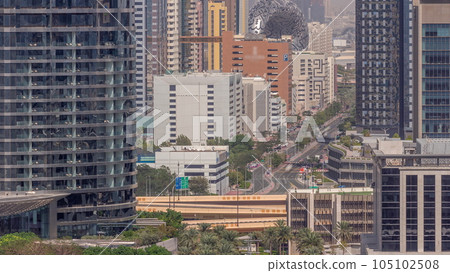 Dubai International Financial district aerial timelapse with road traffic Dubai International Financial district aerial timelapse with road traffic 105102508