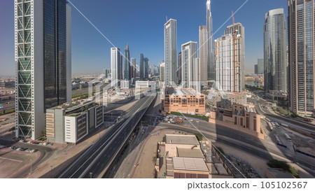 Aerial panoramic view of Dubai Downtown skyline with many towers timelapse. Aerial panoramic view of Dubai Downtown skyline with many towers timelapse. 105102567