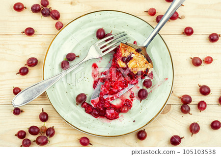 Piece of berry pie on the kitchen table Piece of berry pie on the kitchen table 105103538