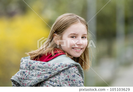 Portrait of cute little girl in autumn park Portrait of cute little girl in autumn park 105103629