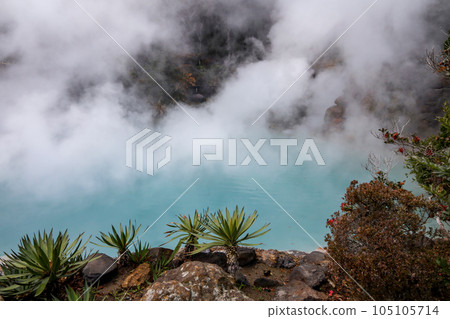 Umi Jigoku blue water hot spring. One of the eight hot springs is landmark in touris location at Beppu, Oita, Japan. Umi Jigoku blue water hot spring. One of the eight hot springs is landmark in touris location at Beppu, Oita, Japan. 105105714