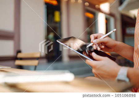 Male hand touching screen tablet close-up. Business, freelance, graphic concept. 105106898