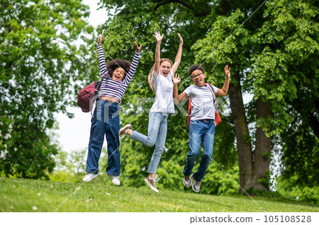 Group of young people feeling excited and happy in the park Group of young people feeling excited and happy in the park 105108528