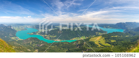 view from the top of Mount Schafberg over the landscape with mountains and Lake Mondsee and Lake Attersee, Alps, Austria 105108962