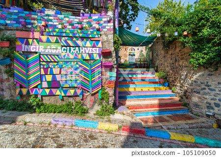 Daytime shot of cafe decorated with multicolored panels, and colorful stairs in Balat District, Istanbul, Turkey 105109050