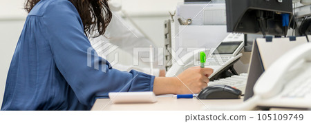 Business woman working in the office, office scene, business scene, desk work Business woman working in the office, office scene, business scene, desk work 105109749