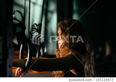 Athletic Beautiful Woman at gym. Close up portrait Athletic Beautiful Woman at gym. Close up portrait 105110973
