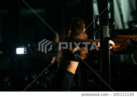 Athletic Beautiful Woman at gym Athletic Beautiful Woman at gym 105111130