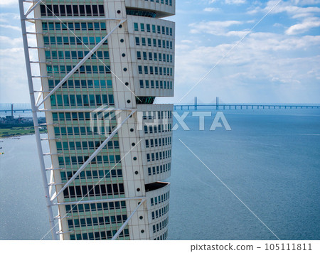 Beautiful aerial panoramic view of the Malmo city in Sweden. Turning Torso skyscraper in Malmo, Sweden. Beautiful aerial panoramic view of the Malmo city in Sweden. Turning Torso skyscraper in Malmo, Sweden. 105111811