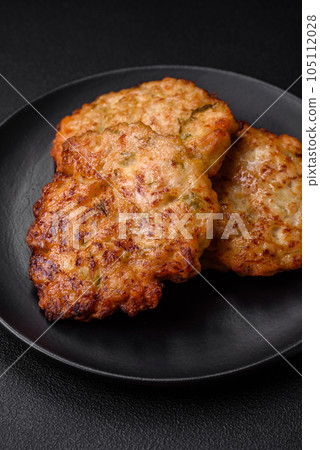 Delicious fresh fried minced chicken meat cutlets with salt, spices and herbs 105112028