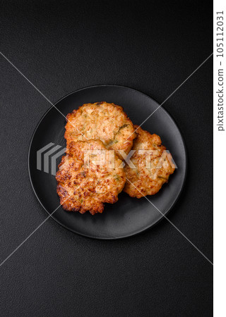 Delicious fresh fried minced chicken meat cutlets with salt, spices and herbs Delicious fresh fried minced chicken meat cutlets with salt, spices and herbs 105112031