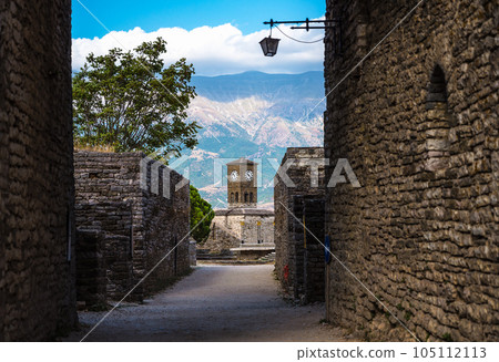 Clock Tower in Gjirokaster Citadel surrounded by ancient ruins, attraction in Albania, Europe 105112113