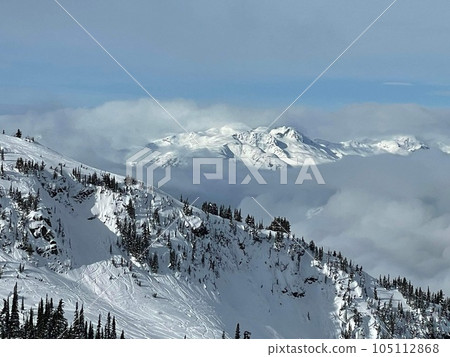snow mountains and clouds 105112868