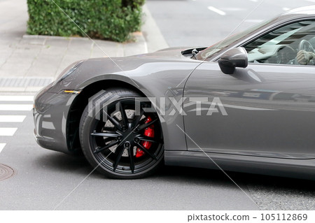 sports car turning left sports car turning left 105112869