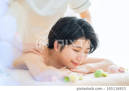 A young woman having an esthetic treatment at an esthetic salon A young woman having an esthetic treatment at an esthetic salon 105116915