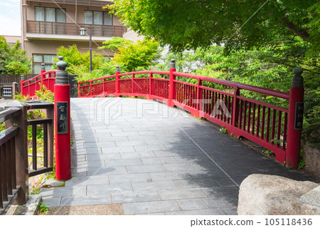A quaint red bridge at Arima Onsen, a famous hot spring resort A quaint red bridge at Arima Onsen, a famous hot spring resort 105118436