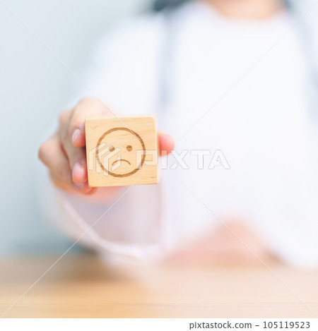 Doctor show Unhappy sad face block, Mental health Assessment, Psychology, Health Wellness, Negative Feedback, Customer Review, Bad Experience, Satisfaction Survey, World Mental Health day concept Doctor show Unhappy sad face block, Mental health Assessment, Psychology, Health Wellness, Negative Feedback, Customer Review, Bad Experience, Satisfaction Survey, World Mental Health day concept 105119523