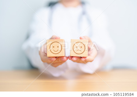 Doctor show Happy smile and Unhappy Sad face block, Mental health Assessment, Psychology, Health Wellness, Feedback, Customer Review, Experience, Satisfaction Survey, World Mental Health day concept Doctor show Happy smile and Unhappy Sad face block, Mental health Assessment, Psychology, Health Wellness, Feedback, Customer Review, Experience, Satisfaction Survey, World Mental Health day concept 105119584