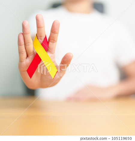 woman holding Red and Yellow ribbon. World hepatitis day awareness month, 28 July, Liver cancer, Jaundice, Cirrhosis, Failure, Enlarged, Hepatic Encephalopathy and Health concept 105119650