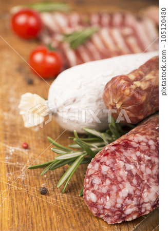 Smoked sausage with rosemary and peppercorns tomatoes and garlic 105120480