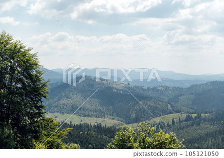 Green Ukrainian mountains. Summer time. Beautiful views of the largest peaks. 105121050