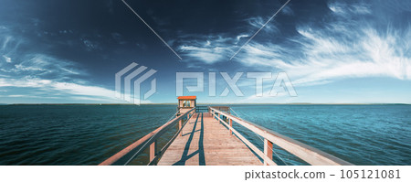 Wooden Pier For Fishing, Small House Shed And Beautiful Lake Or River In Background. Picturesque Natural Landscape In Berezinsky, Biosphere Reserve, Belarus 105121081
