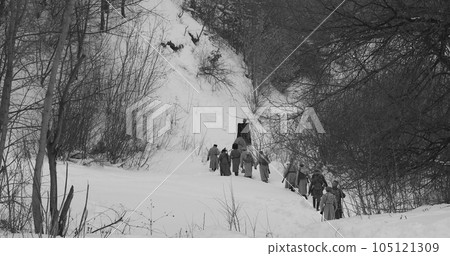 Men Dressed As White Guard Soldiers Of Imperial Russian Army In Russian Civil War s Marching Through Snowy Winter Forest. Historical Reenactment of Civil War. Army on Marching. Black And White Video 105121309