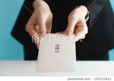 A woman who submits a resignation letter A woman who submits a resignation letter 105122622