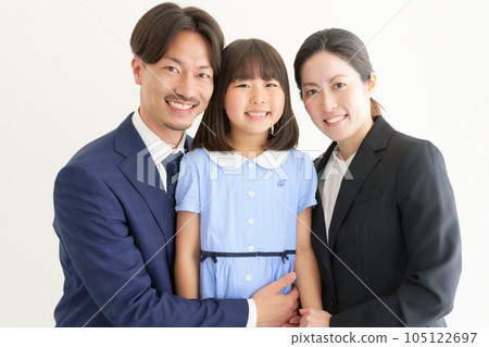 Little girl and her parents in suits Little girl and her parents in suits 105122697