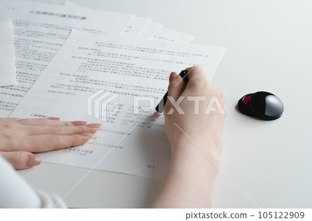 Woman imprinting a contract 105122909