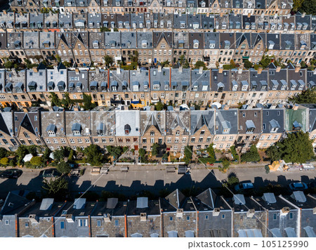 Aerial view of the rooftops of Kartoffelraekkerne neighborhood, in Oesterbro, Copenhagen, Denmark. The neighbourhood built in the late 1800s for working class families 105125990