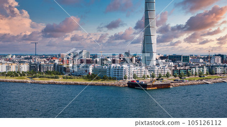 Beautiful aerial panoramic view of the Malmo city in Sweden. Turning Torso skyscraper in Malmo, Sweden. Beautiful aerial panoramic view of the Malmo city in Sweden. Turning Torso skyscraper in Malmo, Sweden. 105126112