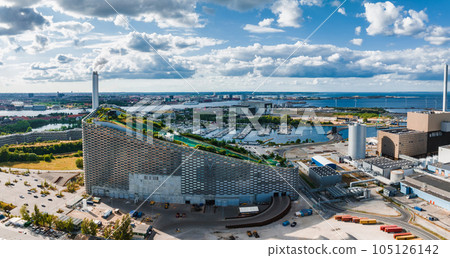 Amager Bakke, Amager Hill or Amager Slope or Copenhill - a heat and power waste-to-energy plant and a sports park in Amager, Copenhagen, Denmark. ESG green energy. 105126142