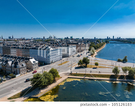 Aerial view of the Copenhagen in Denmark. Central historical part of the city, city roofs and Copenhagen lakes. 105126183