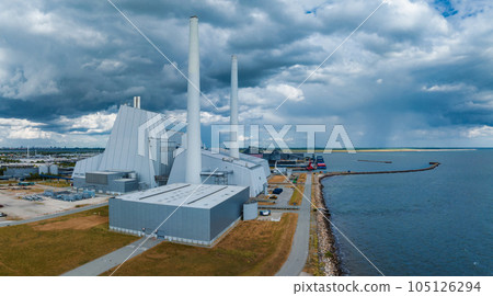 Aerial view of the Power station. One of the most beautiful and eco friendly power plants in the world. ESG green energy in Copenhagen, Denmark. Aerial view of the Power station. One of the most beautiful and eco friendly power plants in the world. ESG green energy in Copenhagen, Denmark. 105126294