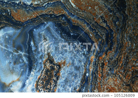 Blue marble. Natural pattern of blue marble. Abstract and blue marble as the design background. A pattern of brown inclusions.Background for designers. Marble tiles for the floor or walls. Blue marble. Natural pattern of blue marble. Abstract and blue marble as the design background. A pattern of brown inclusions.Background for designers. Marble tiles for the floor or walls. 105126809